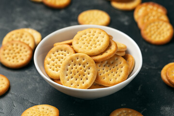 Cheese baked cheddar crackers in a white bowl