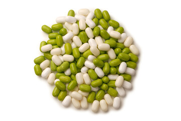 Sweet multicolored candies isolated on white background.