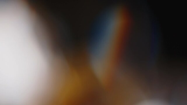 Multicolored light leaks 4k footage on black background lens studio flare leak burst overlays