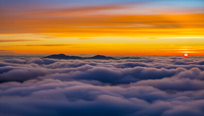 Obraz premium Sunrise or Sunset Above Clouds