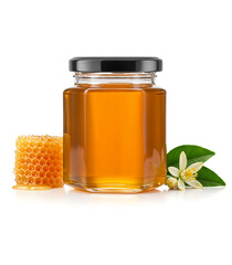 Hexagonal Orange Blossom Honey Glass Jar without branding label placed alongside honeycomb and orange blossom flower with leaves