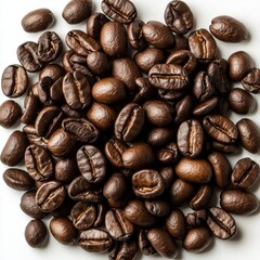 Fototapeta premium Aromatic coffee beans scattered on a bright surface, perfect for illustrating cafes, morning routines, or the rich, comforting flavor of a fresh brew