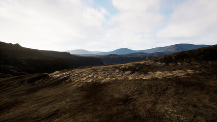 A breathtaking view showcases rugged mountains and deep valleys under a bright sky. Sunlight casts shadows over the rocky terrain, highlighting the natural beauty of the wilderness.