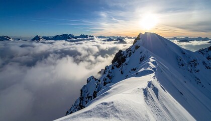 Golden sunlight over misty mountain ridges
