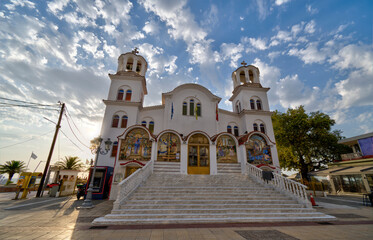 Paralia, Katerini, Greece 14.08.2025: Famous greek orthodox Church Agia Paraskevi on the shore of Aegean Sea.