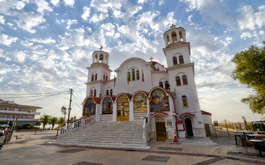 Paralia, Katerini, Greece 14.08.2025: Famous greek orthodox Church Agia Paraskevi on the shore of Aegean Sea.
