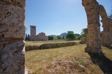 Abbey of San Vincenzo al Volturno, province of Isernia, Molise, Italy and in the foreground what remains of the Portico del Pellegrino