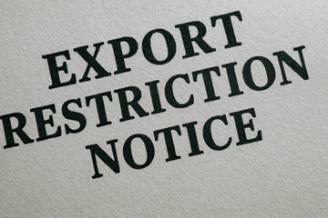 Export restriction notice rare earth geopolitical impacts on global trade printed on textured paper conveying urgency and policy concern