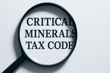 Critical mineral earth geopolitical tax code magnifying glass page document policy review urgent