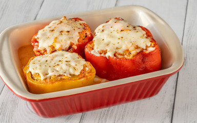 Colorful bell peppers baked with bolognese sauce and golden melted mozzarella topping