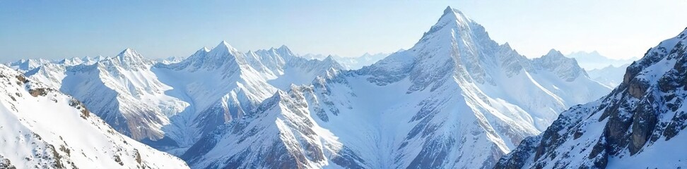 Breathtaking Panoramic View of a Pristine Snow-Covered Mountain Range Reflecting a Clear Sky, Offering a Serene and Majestic Winter Landscape Untouched by Human Presence.