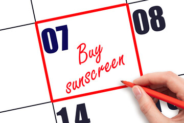 7 th day of the month.  Hand writing Buy sunscreen reminder and drawing red frame on calendar. Concept skin care, health care. Travel planning concept. Planning and scheduling