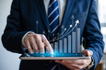 Business Growth Chart Businessman Analyzing Positive Financial Data on Tablet