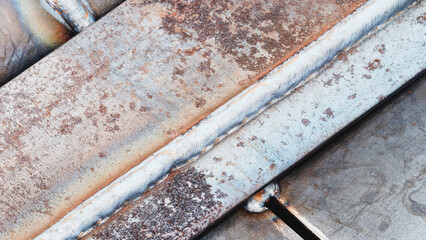 Welding seam of modern industrial welding machine, industrial concept background.