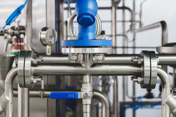 view of industrial machine pipes in factory, industrial concept background.