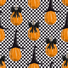 Charming autumn pumpkins with a tied black bows and witch hats on checkered background. Halloween seamless pattern. Vector illustration.