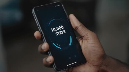 Mobile phone with a reminder to take 10,000 steps a day.