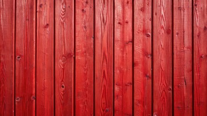 Closeup of weathered red wooden fence with vertical planks and glossy finish