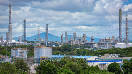 Landscape view of a large oil refinery and chemical plant under the open sky,