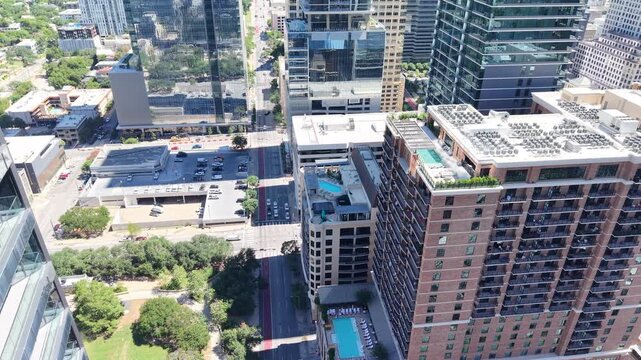 Cars, trucks and trailer movement in downtown Austin, Texas. A true representation of a typical day in the capital's urban core. Aerial drone 4k view