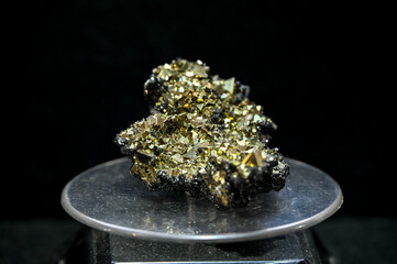 Pyrite. Crystals and minerals on display at the fair. Close-up of crystals.