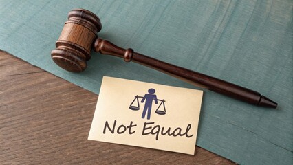 Wooden mallet and card conveying the Not Equal concept