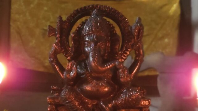 Ganesha statue decorated with flowers