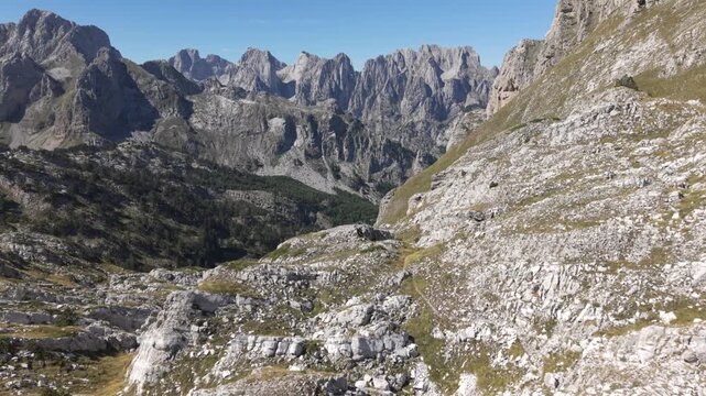 A hike day to the Albanian Mountains up to the border of Montenegro follow by a drone during Autumn or late summer season