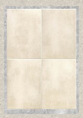 Four beige tiles arranged in a square grid with a gray border