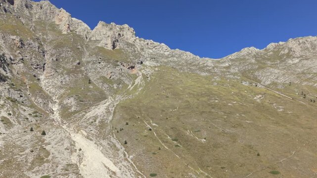 A hike day to the Albanian Mountains up to the border of Montenegro follow by a drone during Autumn or late summer season