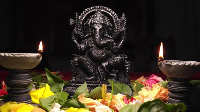 Ganesha statue decorated with flowers