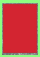 A red square centered within a gray textured border on a green background