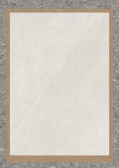 A blank sheet of textured paper framed by a wooden border on a gray surface