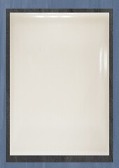A plain off-white rectangular surface framed by a dark border against a blue background