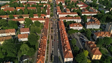 Aerial view of symmetrical city architecture with red toofs in Oświęcim, Poland