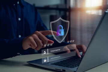 Cybersecurity login concept with digital lock shield and username password interface on laptop, representing online data protection, privacy authentication, secure access, safe internet connection.