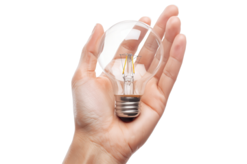 A delicate hand cradles a glass light bulb against a transparent background, showcasing its clarity.
