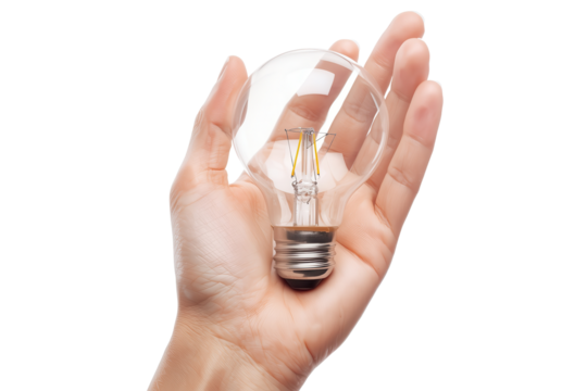 A delicate hand cradles a glass light bulb against a transparent background, showcasing its clarity.