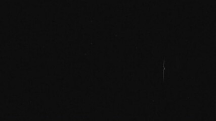 Big carved pumpkin jack o lantern smiling face flickers on black background. Halloween motion animation. Halloween postcard background