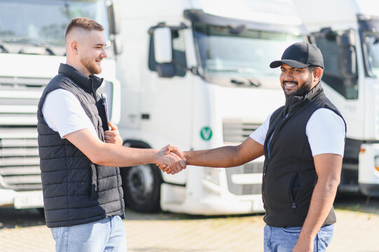 People shaking hands making a transport business deal