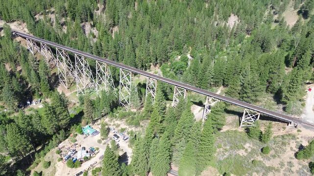 Clio trestle in northern California. High angle shot that rotates and pans around the structure.