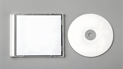 Blank white C D case and disc on gray background CD case