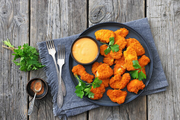 breaded chicken breast chunks with dipping sauce