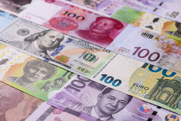 Paper money, banknotes of different countries as a business background. Paper money and cash