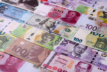 Paper money, banknotes of different countries as a business background. Paper money and cash