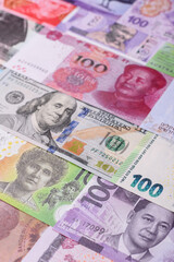 Paper money, banknotes of different countries as a business background. Paper money and cash