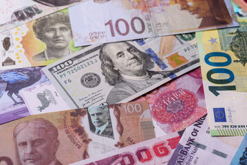 Paper money, banknotes of different countries as a business background. Paper money and cash