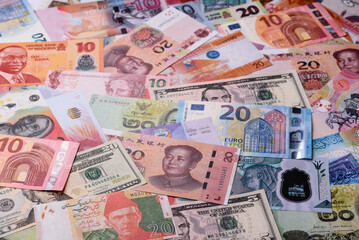 Paper money, banknotes of different countries as a business background. Paper money and cash