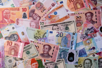 Paper money, banknotes of different countries as a business background. Paper money and cash