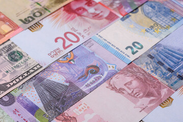 Paper money, banknotes of different countries as a business background. Paper money and cash
